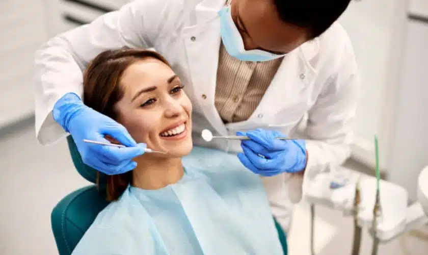 Ballantyne Orthodontic Care Doctor Examining Patient’s Teeth During Treatment