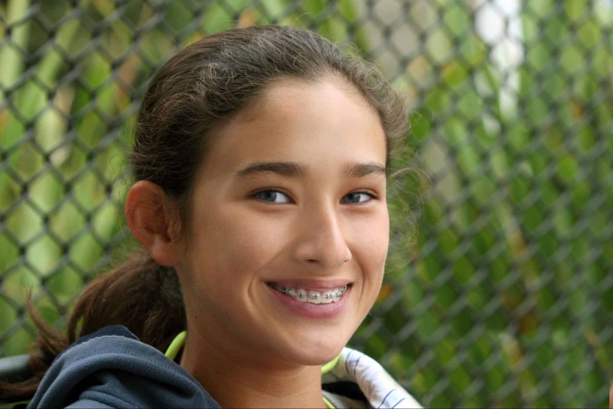 Teen Smiling After Braces Treatment Near Chantilly Nc